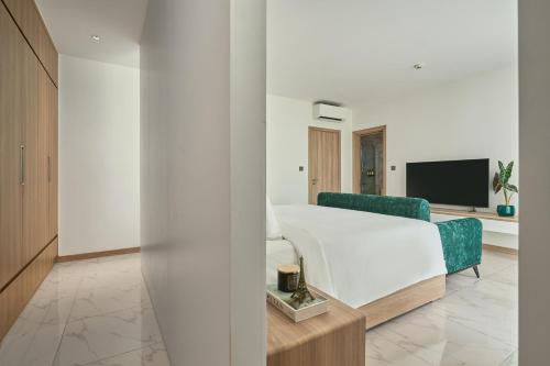 Μια τηλεόραση ή/και κέντρο ψυχαγωγίας στο Noden2 Hotel & Apartment