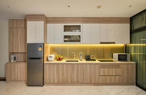 Η κουζίνα ή μικρή κουζίνα στο Noden2 Hotel & Apartment