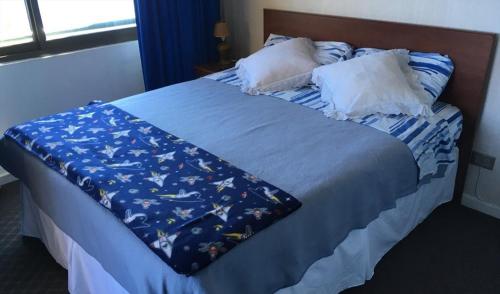 Llit o llits en una habitació de Puesta del sol