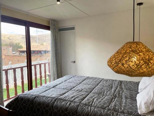 Кровать или кровати в номере La Casa del Valle - Huaripampa