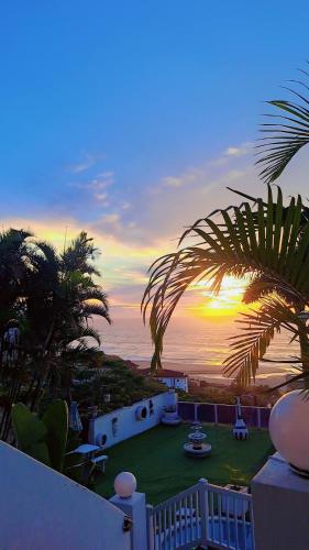 a view of a sunset from the balcony of a house at Sunset Roof in Margate