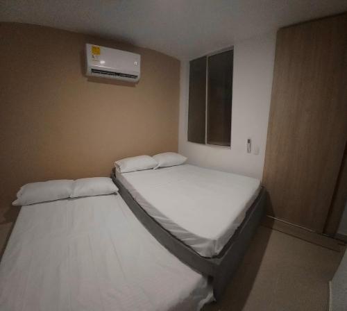 Postel nebo postele na pokoji v ubytování Moderno apartamento en Barranquilla