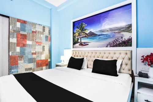 Postel nebo postele na pokoji v ubytování Super Hotel O Vaishali Nagar