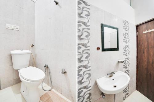 Koupelna v ubytování Super Hotel O Vaishali Nagar