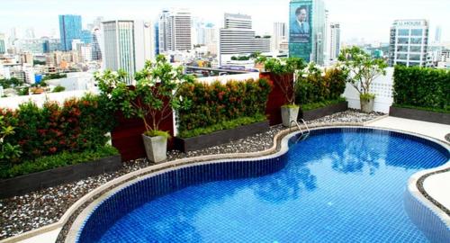 a large swimming pool on top of a building at convenient&peaceful place in Soi nai leot in Bangkok