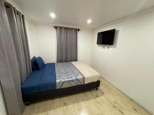 Postel nebo postele na pokoji v ubytování 1BR Inland Oasis