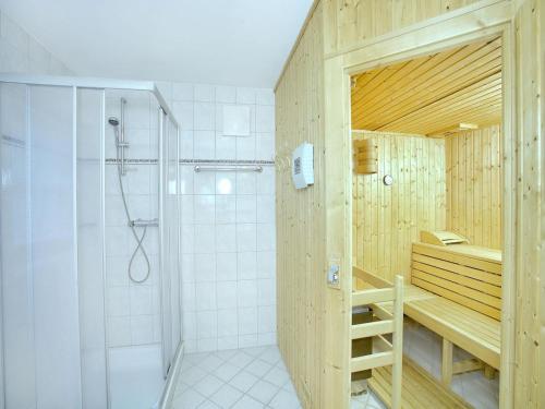 a bathroom with a shower and a sink and a shower at Chalet in Austria near Ski Bus and Sauna in Wald im Pinzgau