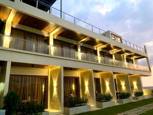 Фотография из галереи Summer Coastal Suites в городе Bacnotan