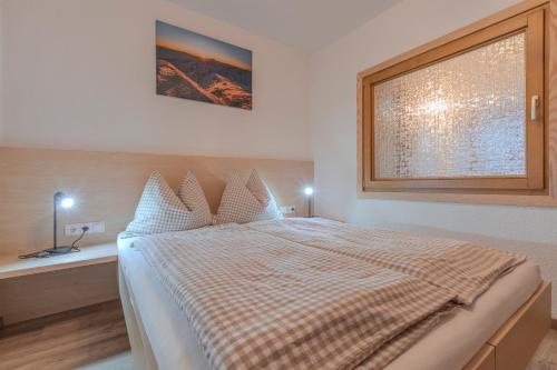 Cama o camas de una habitación en Ferienhaus Ban Brösign
