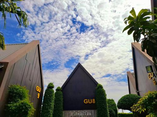 a building with a cloudy sky in the background at Sawasdee​ Buriram​ Resort in Buriram