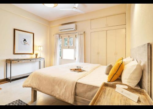 Кровать или кровати в номере Avaanti Boutique Stays By Avaanti Stays