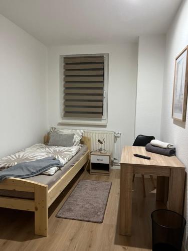 Postel nebo postele na pokoji v ubytování Pension Palm