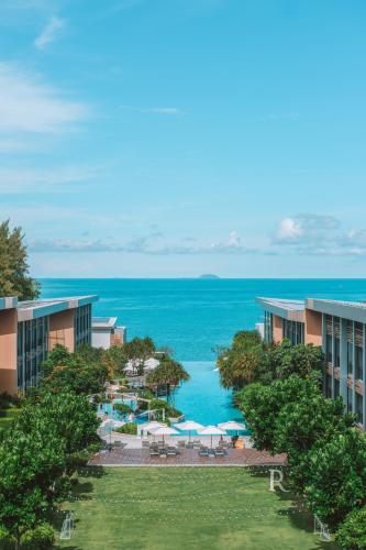 an aerial view of the resort with the ocean in the background at Renaissance Pattaya Resort & Spa in Na Jomtien