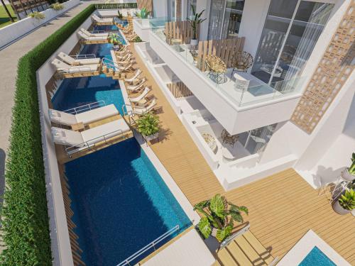 an aerial view of a hotel with a pool at Sirines Luxury Hotel & SPA- Adults Only in Rethymno Town