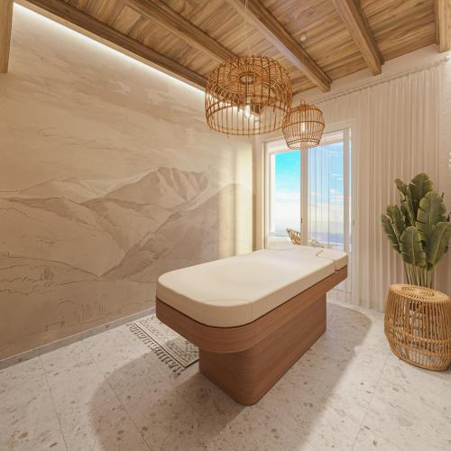 a bathroom with a bath tub with a painting on the wall at Sirines Luxury Hotel & SPA- Adults Only in Rethymno Town