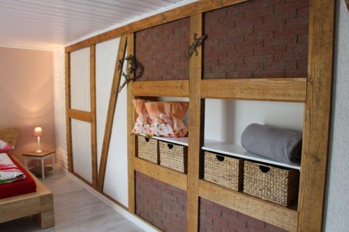 Postel nebo postele na pokoji v ubytování Inas Spreewaldstube