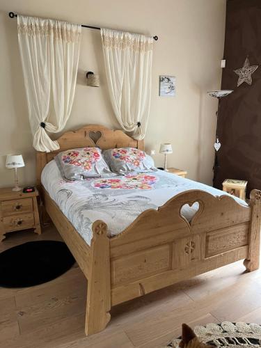Postel nebo postele na pokoji v ubytování Agréables chambres au calme