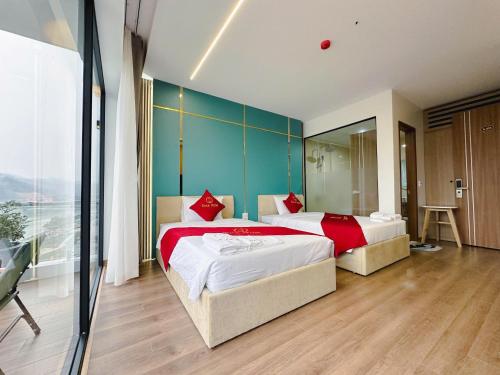 Postel nebo postele na pokoji v ubytování SOCA Hotel LAO CAI