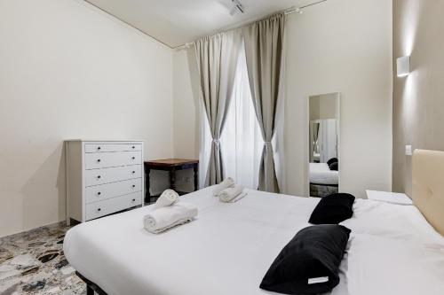Posteľ alebo postele v izbe v ubytovaní VIVILO COLLECTION - San Vito View Apartment - 3 BDR 2 BATHS