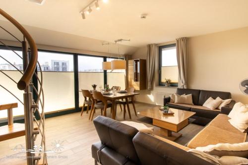 Posezení v ubytování 57 Ferienwohnung Meerblick Strandburg App.2.1