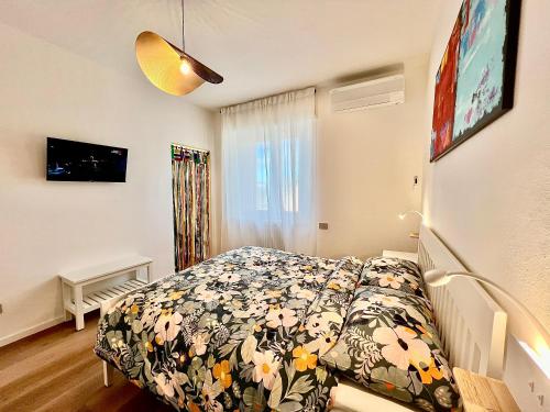 Ένα ή περισσότερα κρεβάτια σε δωμάτιο στο Chianti 67 Home Holiday