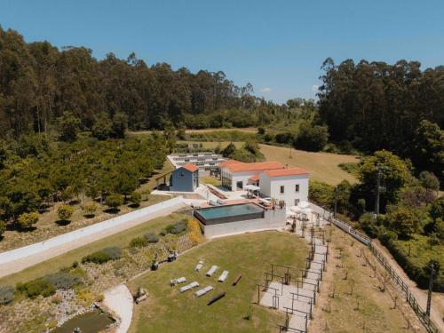 an aerial view of a building with a yard at Casa da Milheira - Agroturismo in Oliveira de Azemeis