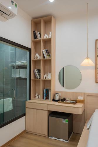 a bathroom with a sink and a mirror at Thiên Trường An Garden in Ninh Binh