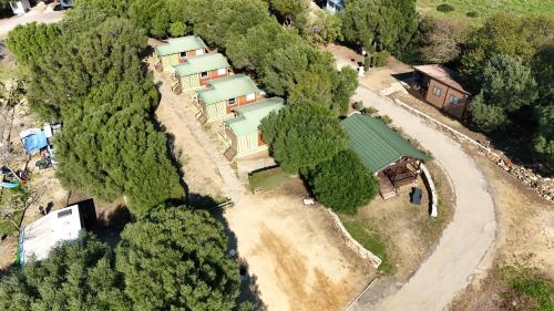 an aerial view of a house in the forest at TAIGA Tarifa Valdevaqueros in Tarifa