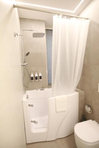Ένα μπάνιο στο Unique Luxury Stay