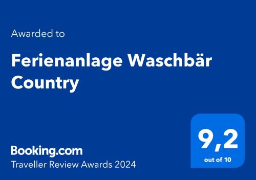 Certificado, premio, señal o documento que está expuesto en Ferienanlage Waschbär Country