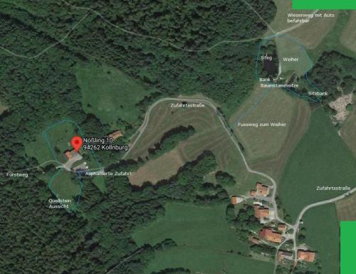 a map of a park with a red marker at Ferienhaus Woidhaus in Kollnburg