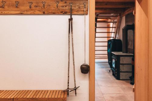 a swing hanging on a wall in a room at Ferienhaus Woidhaus in Kollnburg