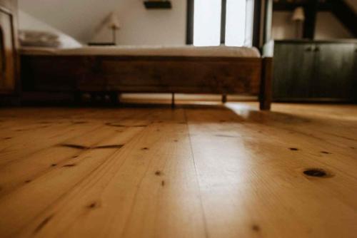 an empty room with a bed and a wooden floor at Holiday home in Smarje pri Jelsah Stajerska Untersteiermark 26087 in Šmarje pri Jelšah