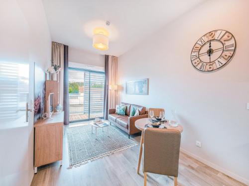 Et tv og/eller underholdning på Zenao Appart'hôtels Cenon