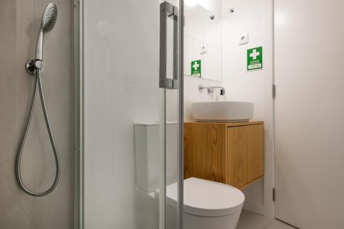 Et badeværelse på Cozy Figueira Apartment