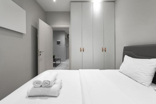 Posteľ alebo postele v izbe v ubytovaní Cosmopolitan, Nilie Hospitality MGMT