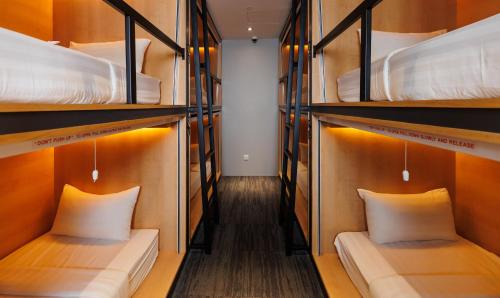 Ένα ή περισσότερα κρεβάτια σε δωμάτιο στο The Bed Bukit Bintang