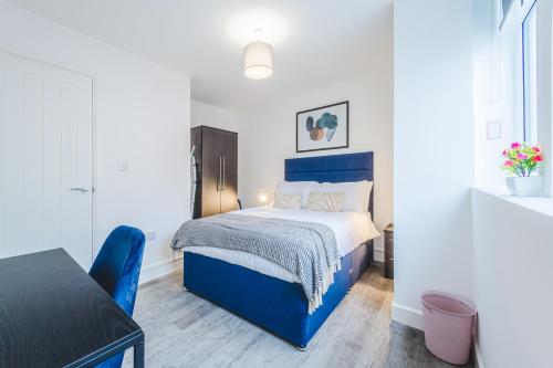 Ένα ή περισσότερα κρεβάτια σε δωμάτιο στο The Regent Circus Apartments