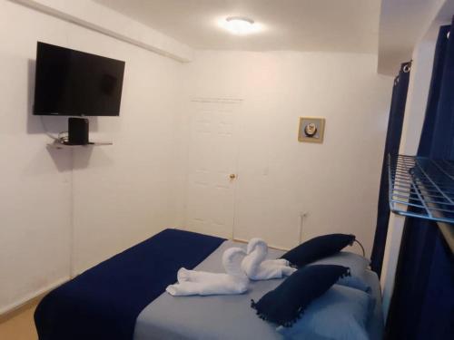 Postel nebo postele na pokoji v ubytování Casa Esmeralda