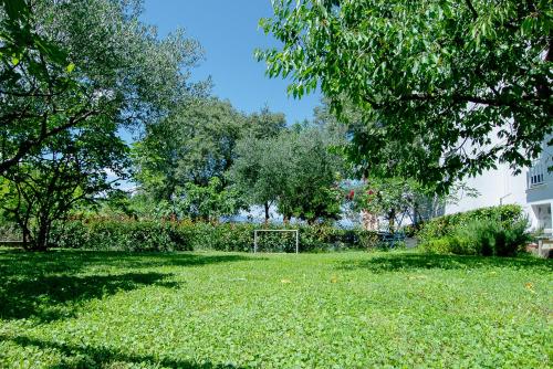 a field of grass with a soccer ball in it at Pension Silvia in Međugorje