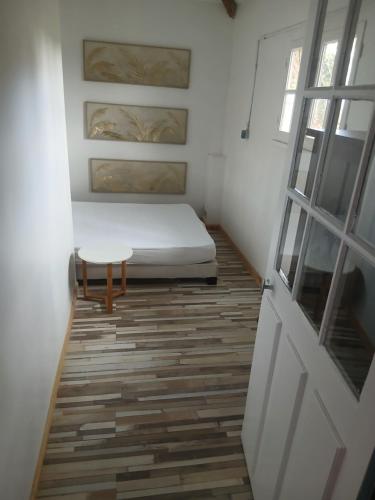 Postel nebo postele na pokoji v ubytování Les Coquelicot