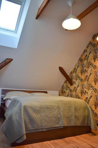 Postel nebo postele na pokoji v ubytování Apartmány pod Prašivou