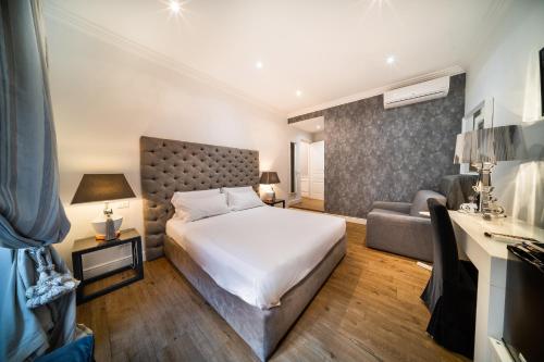 Postel nebo postele na pokoji v ubytování Vatican Chic B&B