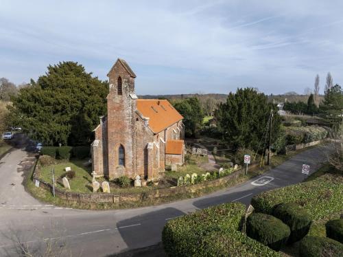 an old church on the side of a road at The Old Church in Ringwood