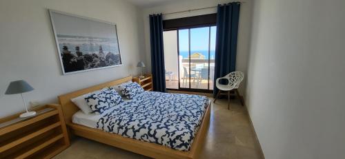 Postel nebo postele na pokoji v ubytování Fantastic Sea & Gibraltar View apartment