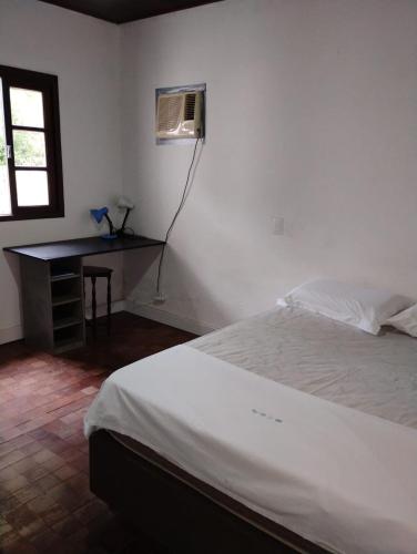 Katil atau katil-katil dalam bilik di Casa na Vargem Pequena á 4 minutos de canasvieiras
