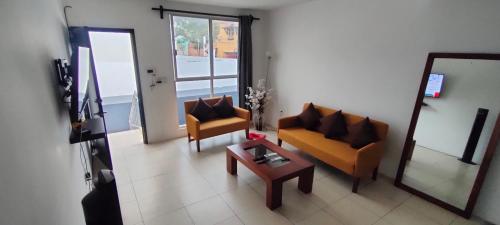 Μια τηλεόραση ή/και κέντρο ψυχαγωγίας στο Apartment with Xochimilco garage