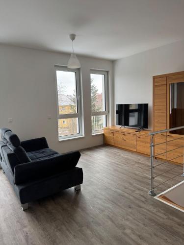 Posezení v ubytování Wunderschöne Maisonette Ferienwohnung in Leipzig Taucha 2 u 3 OG Mitte
