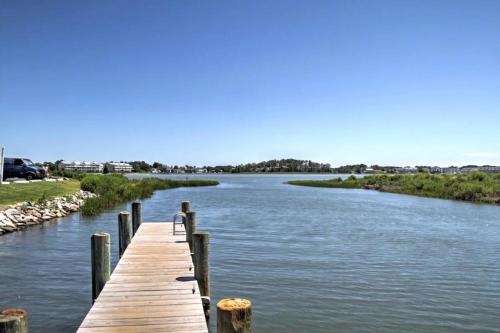 a wooden bridge over a river with at Bethany Bay --- 37460 Pettinaro Dr #6801 in Ocean View