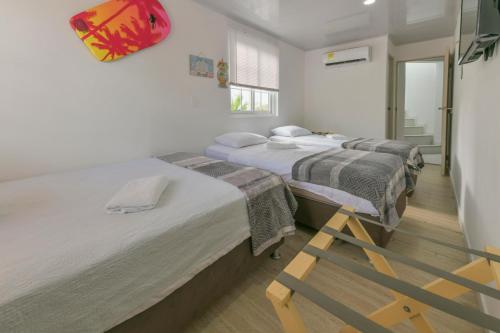 Cama ou camas em um quarto em Hotel Las Lunas